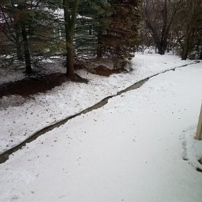 2019-03-14 16.40.10 A River Runs Through It - back yard run-off from the winter's snow melt