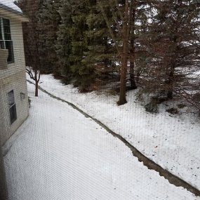2019-03-14 16.41.34 A River Runs Through It - back yard run-off from the winter's snow melt