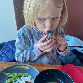 March 27 - 2 Sushi and mizo soup - she DOES really like this despite the face