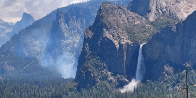 20230614_121420 Yosemite Valley. In the background - Half Dome. Center - some smoke from prescribed burns. On the right, Bridalveil Fall.